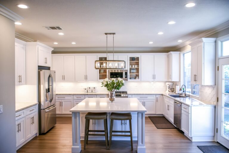 Open concept kitchen and dining area with pendant lighting