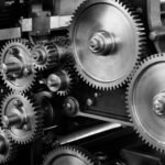 Industrial close-up of interlocking gears representing precision engineering, automation, and mechanical efficiency.