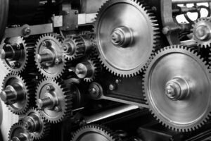 Industrial close-up of interlocking gears representing precision engineering, automation, and mechanical efficiency.