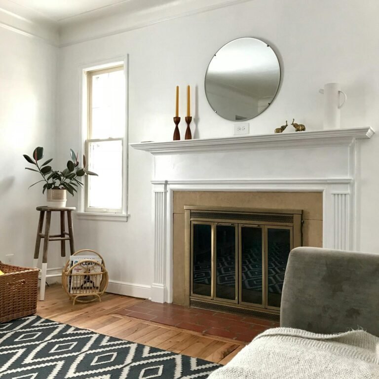 Neutral-colored living area with a fireplace and minimal décor