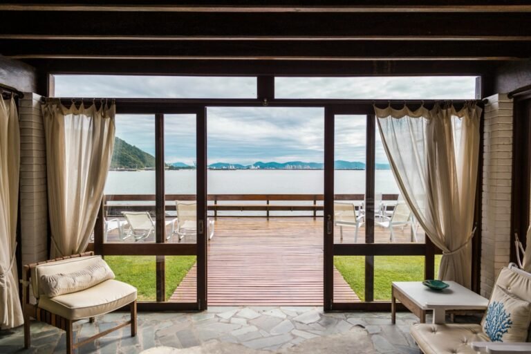 Oceanfront patio with wooden deck and panoramic sea view