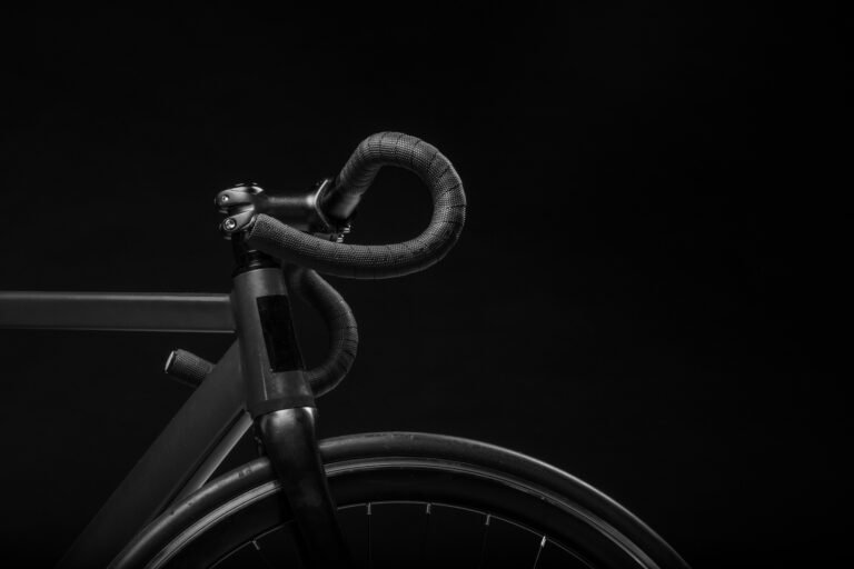Black bicycle handlebar and frame detail.