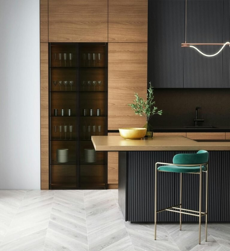 Sleek kitchen interior featuring wood panel walls, dark cabinets, and stylish barstools.