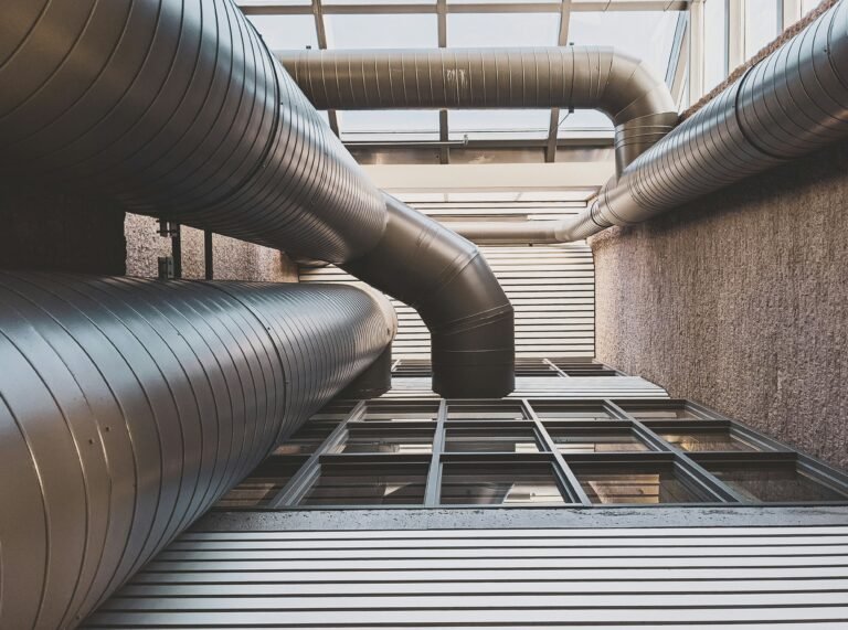 Large industrial ventilation ducts on a rooftop.