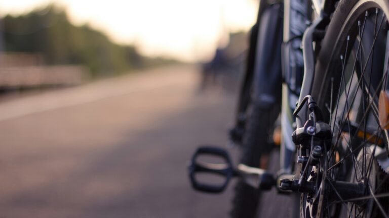Row of bikes parked on a street