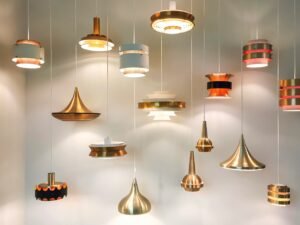 Assorted copper pendant lights displayed at varying levels