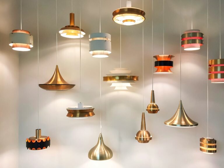 Assorted copper pendant lights displayed at varying levels