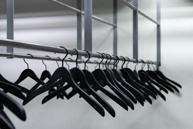 Row of black clothes hangers