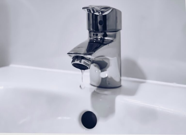Modern bathroom faucet with running water