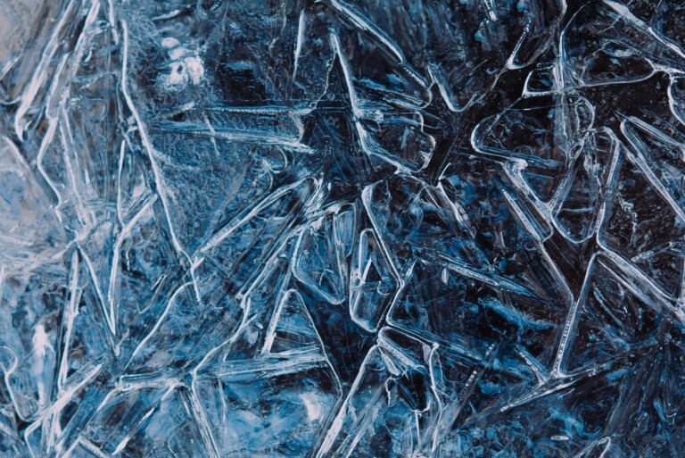 Close-up of deep blue, crystalline-like texture in an abstract design.