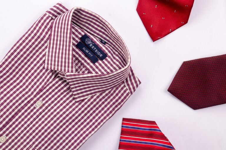 Dress shirt and tie folded on a flat surface