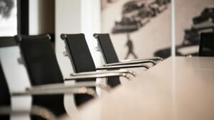 Sleek black office chairs aligned in a modern workspace