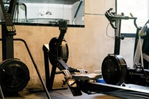 Home gym with rowing machines and fitness equipment