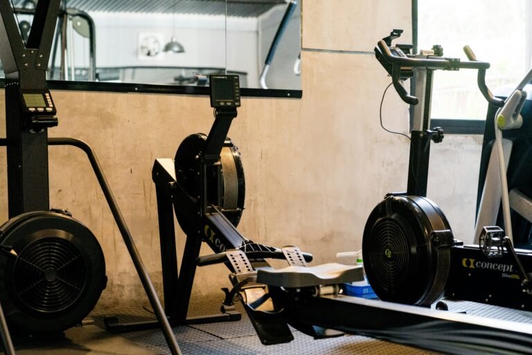 Home gym with rowing machines and fitness equipment